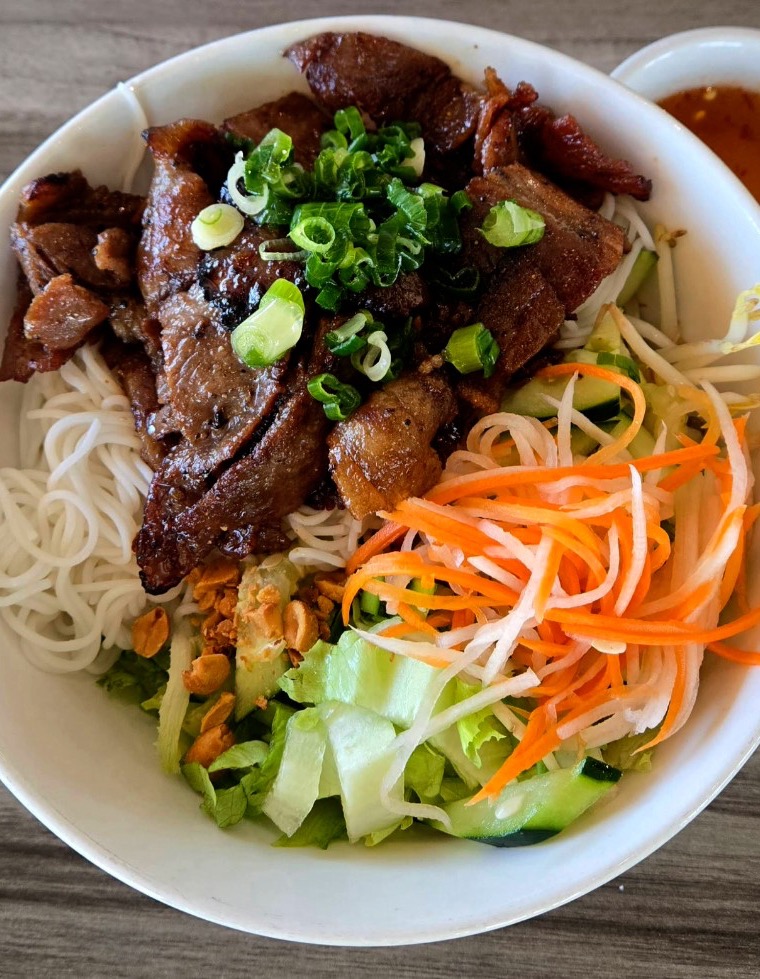 Bún Thịt Nướng — chargrilled pork vermicelli with fresh herbs and pickled vegetables